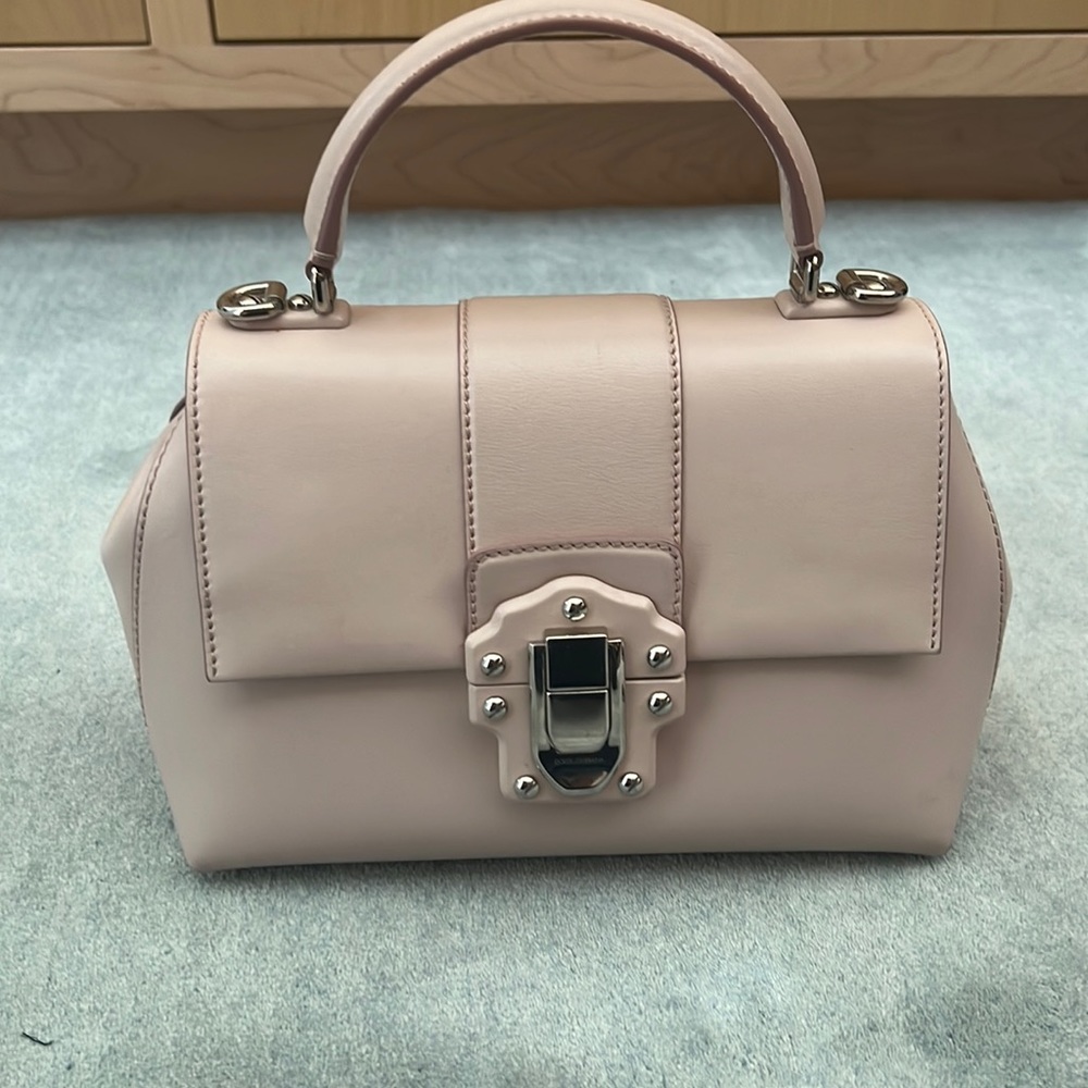 Soft pink. The bag was purchased in Milan, Italy.